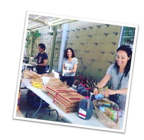 Judith volunteering at a community food share program