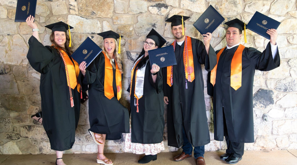 Sierra Hendren and classmates celebrating graduation from a cardiovascular sonography program